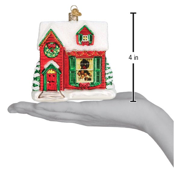You're Home farmhouse ornament on an open palm beside a 4 inch height marker