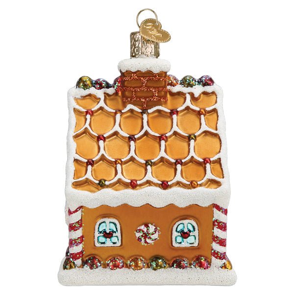 Side of the gingerbread cottage ornament showing caramel scalloped shingles on the roof