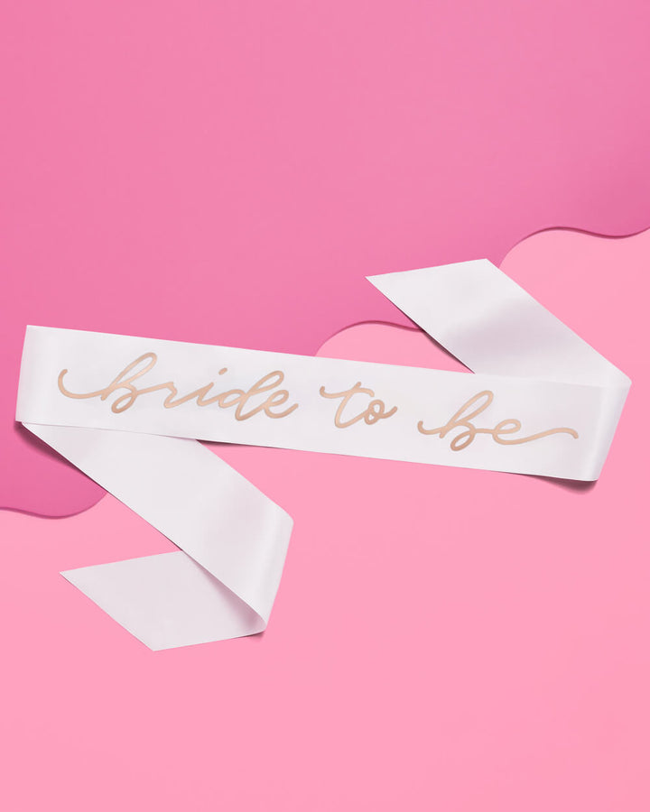 White party sash with rose gold C'est La Vie lettering