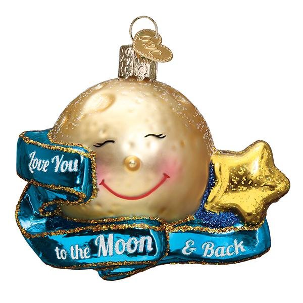 Front of the gold moon ornament with rosy cheeks, a blue ribbon banner, and a glittered gold star