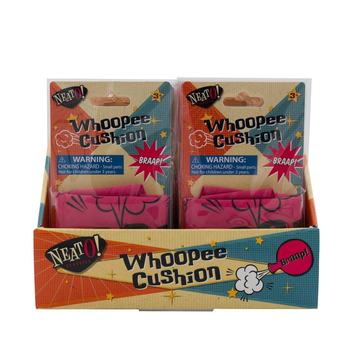 Front view of the whoopee cushion display with two carded pink cushions, classic prank toys for kids
