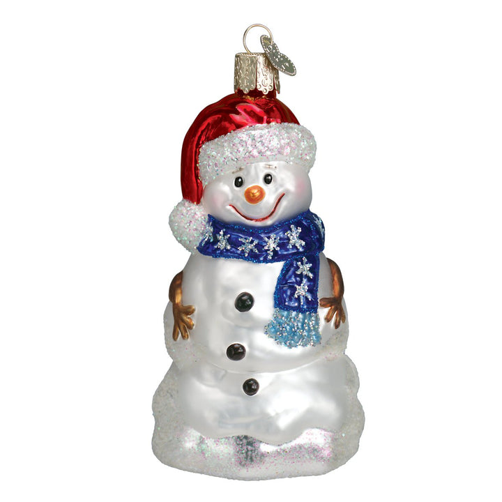 Front of the happy snowman ornament in a red Santa hat and blue snowflake scarf, on white