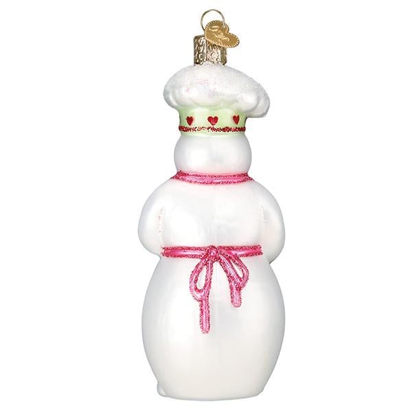 Back of the snow woman chef ornament showing her pink apron bow, on white
