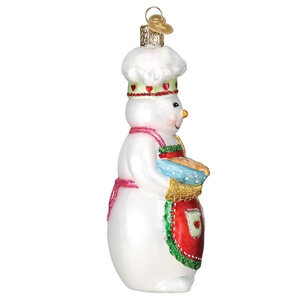 Side of the snow woman chef ornament holding her bowl and spoon