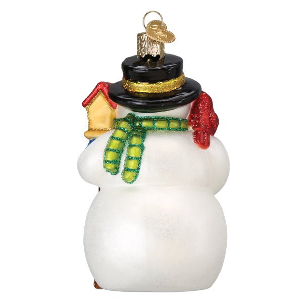 Back of the snowman ornament showing his green scarf and the yellow birdhouse