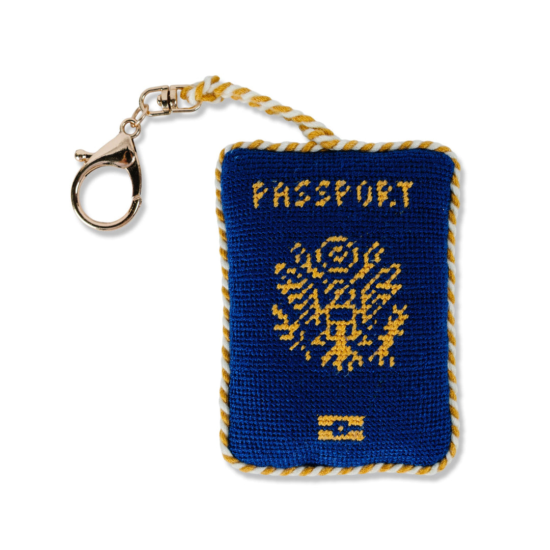 Needlepoint passport bag charm with a lobster clasp