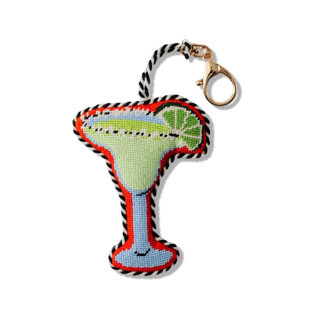 Needlepoint margarita bag charm with a salt rim and lime