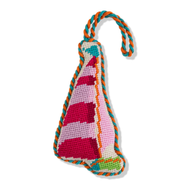 Sailboat needlepoint ornament, front view of a pink and raspberry striped sail with teal pennant