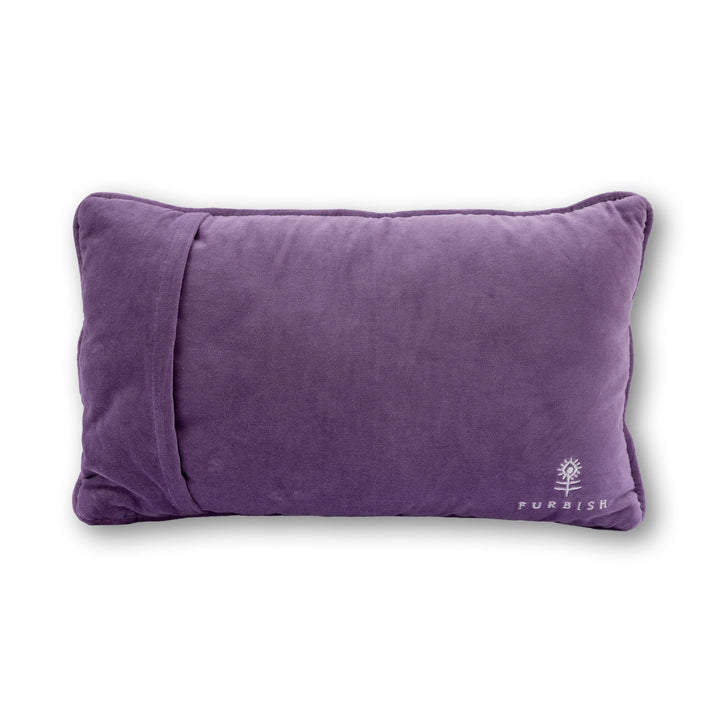 Purple velvet back of a needlepoint throw pillow with an embroidered flower logo for home decor