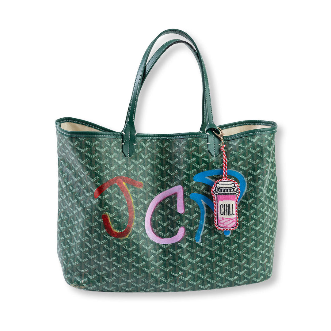 Needlepoint chill pill bag charm with a lobster clasp