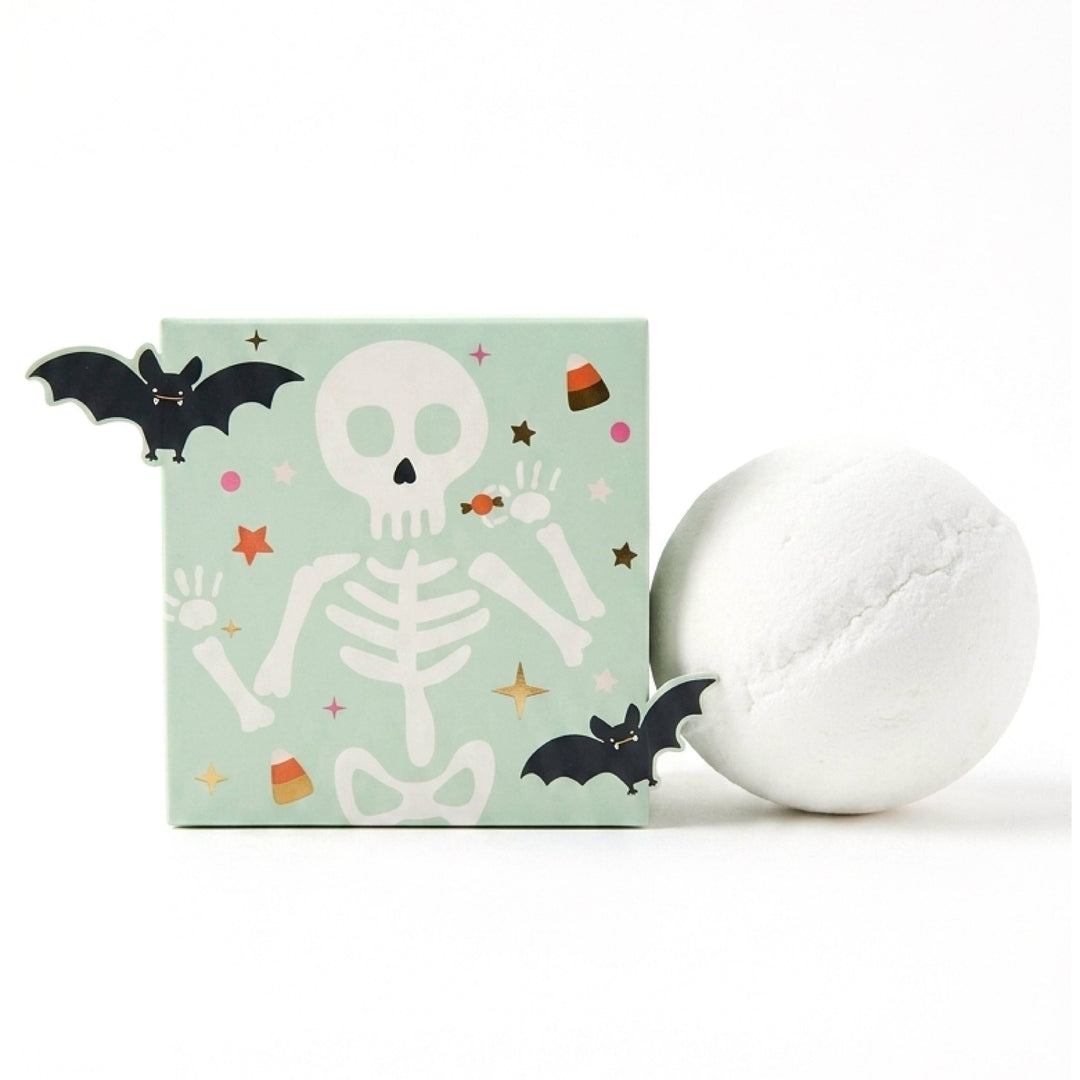 White bath bomb with mint green skeleton box trimmed in bats and candy corn, ready for a Halloween boo basket