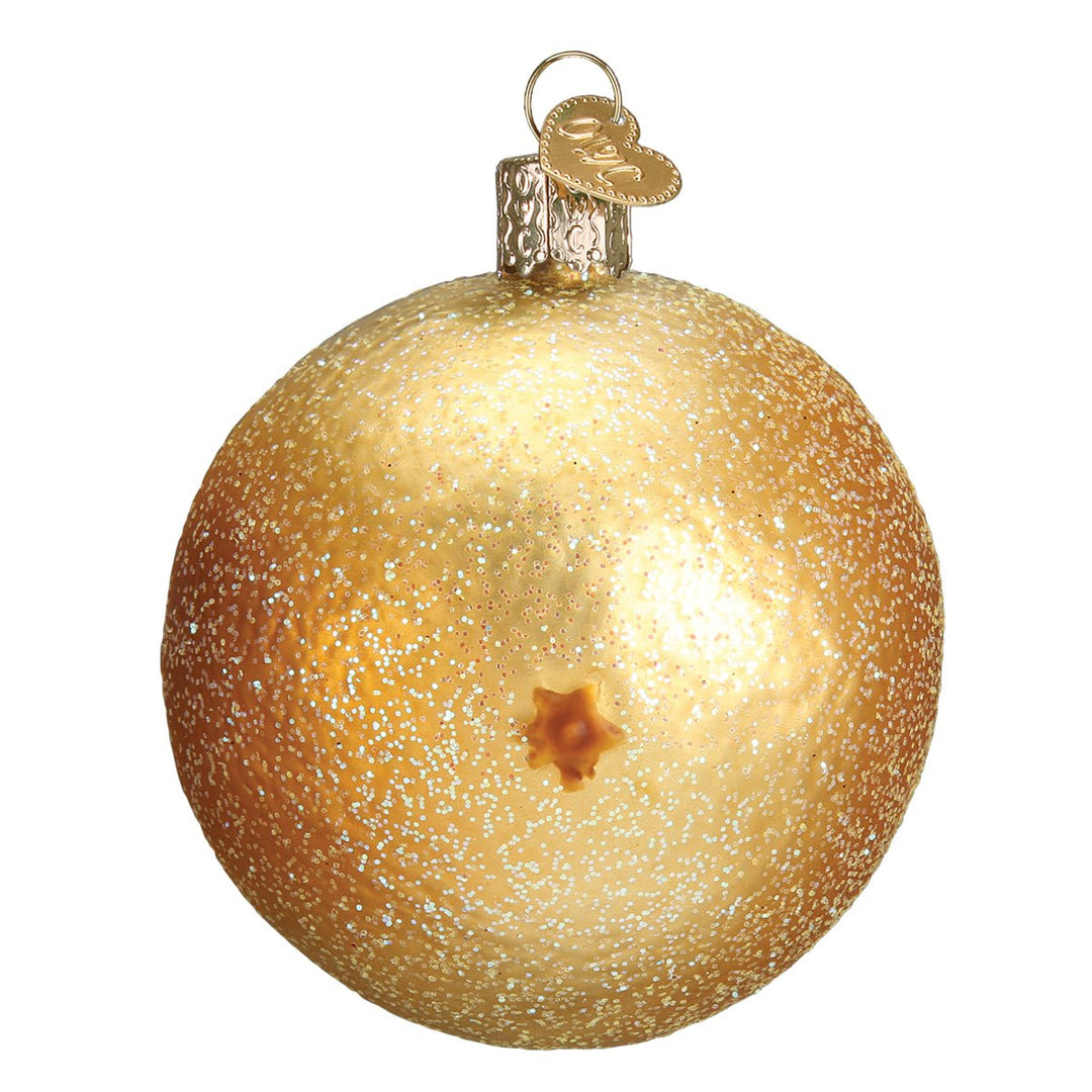 Back of the grapefruit ornament showing the round glittered gold peel, on white