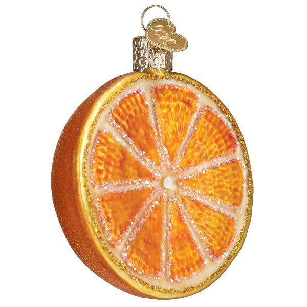 Front of the orange slice ornament with glittered segments and a golden rind, on white