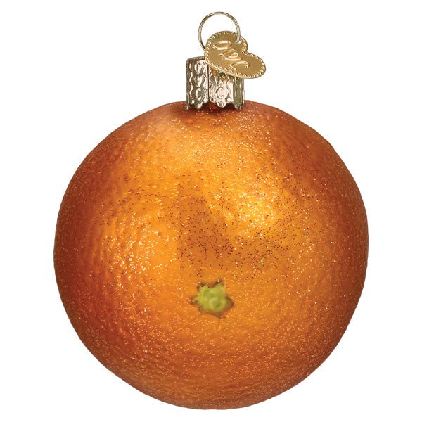 Back of the orange ornament showing the whole round peel with a green stem end, on white
