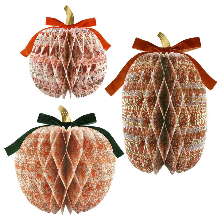 Meri Meri X Liberty Paper Honeycomb Pumpkins on white background, 3D tissue paper pumpkin shapes with Liberty floral print