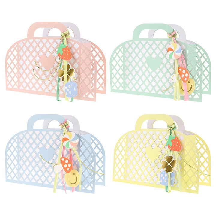 Meri Meri Charm party bags on white background, colorful bags with charm and jewel print design for birthday favors
