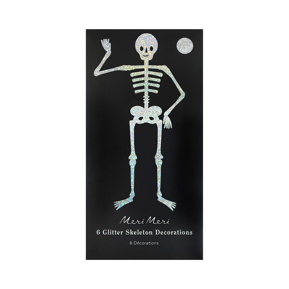 Silver glitter skeleton Halloween decoration on black packaging labeled six skeleton decorations