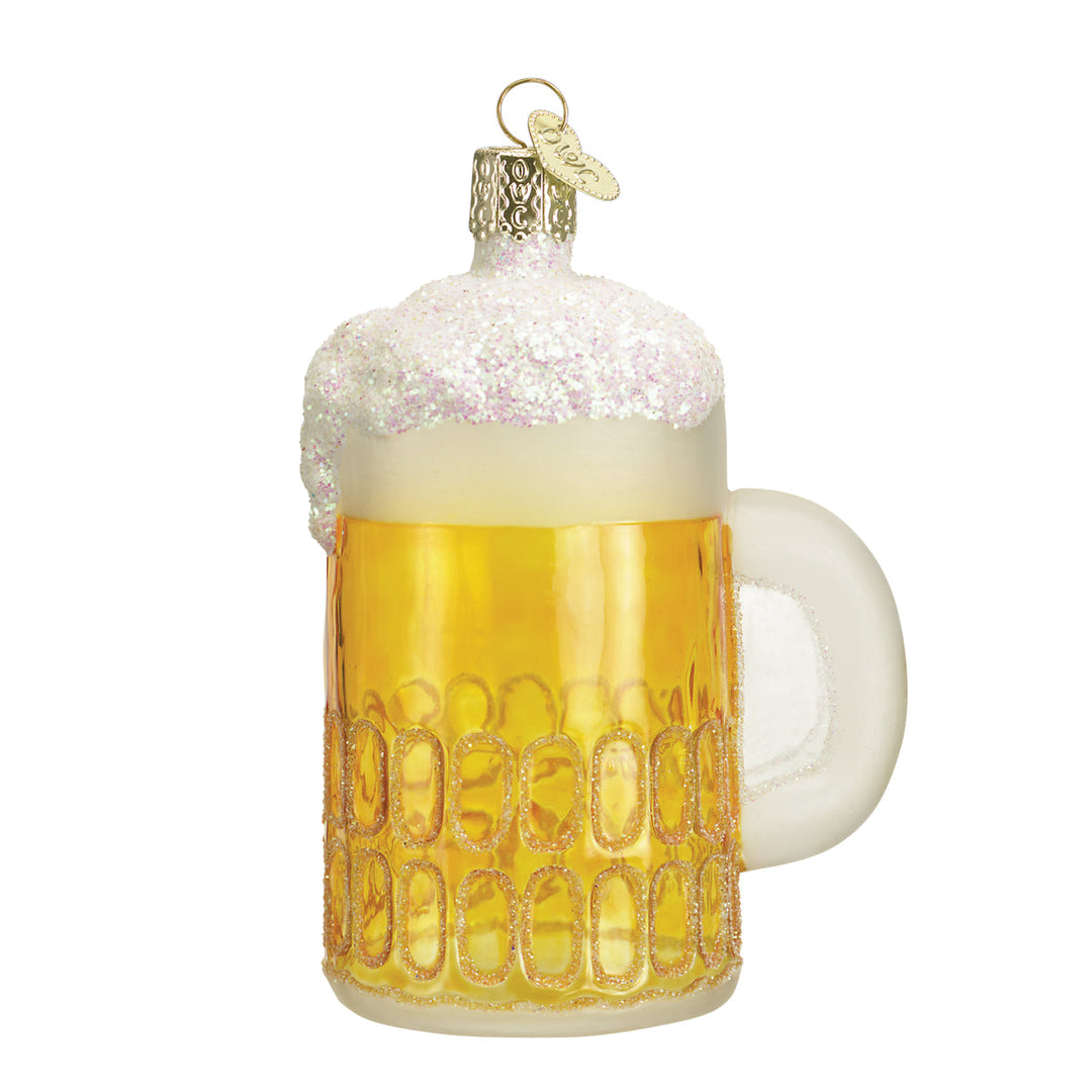 Mug of beer glass ornament, front view, golden dimpled mug with frothy white foam on white