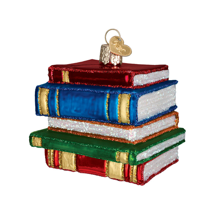 Stack of books ornament in red, blue, white, and green hardcovers with gold spines on a white background, front view