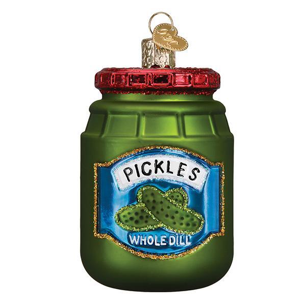Front of the jar of pickles ornament with a red lid and blue Pickles Whole Dill label, on white