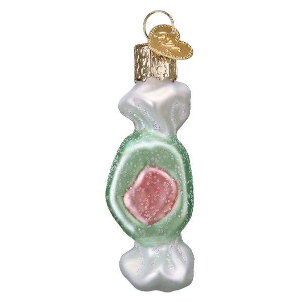 Mint green salt water taffy ornament with a pink square center and white wrapper