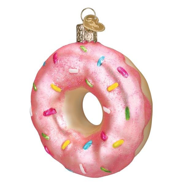 Pink frosted donut ornament with rainbow sprinkles, angled front view on white