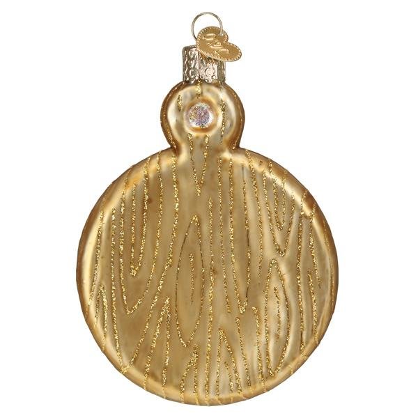 Back of the charcuterie board ornament, a plain golden wood-grain board with handle