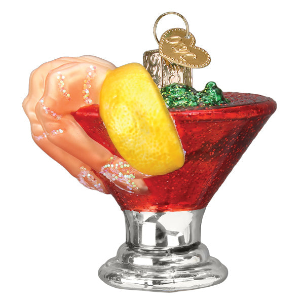 Shrimp cocktail ornament with pink shrimp and a lemon wedge on a red coupe with silver stem, front view