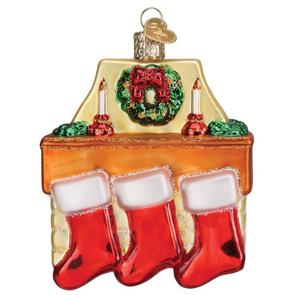 Front of the family of 3 stockings ornament with three red stockings on a mantel under a green wreath, on white