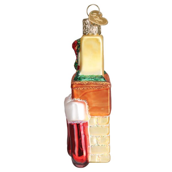 Side view of the family of 4 stockings ornament with stockings hanging from the mantel edge, on white