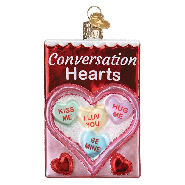 Conversation Hearts candy box glass ornament with pastel hearts reading Kiss Me and Be Mine, front on white
