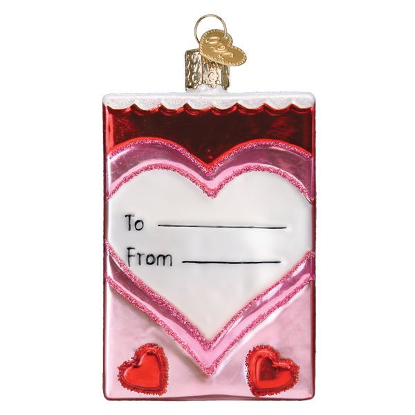 Back of the conversation hearts ornament with a pink heart To and From panel and red glitter hearts