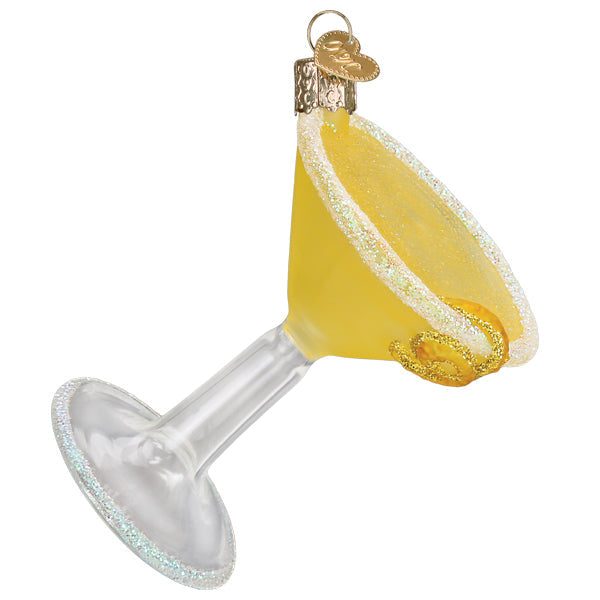 Lemon drop martini ornament with a sugared rim and lemon twist, on white