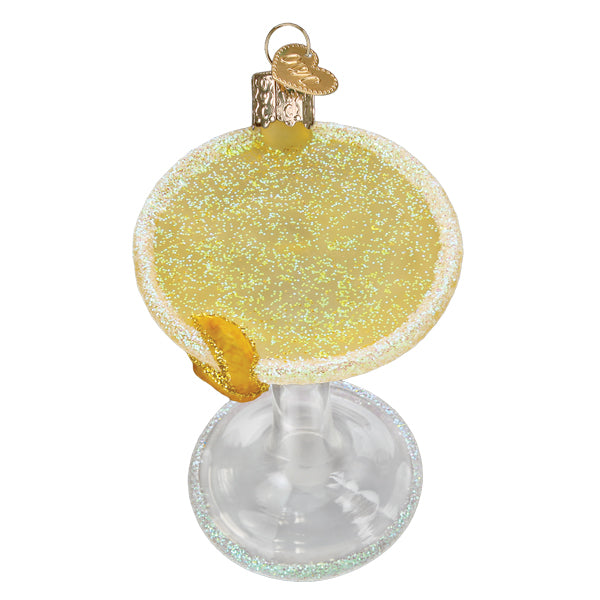 Top-down view of the lemon drop martini ornament with its glittered yellow surface