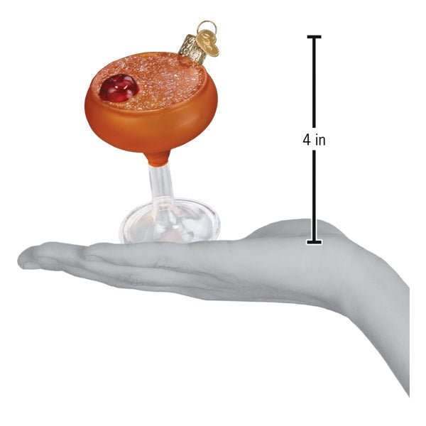 Manhattan cocktail ornament on an open palm beside a 4 inch height marker