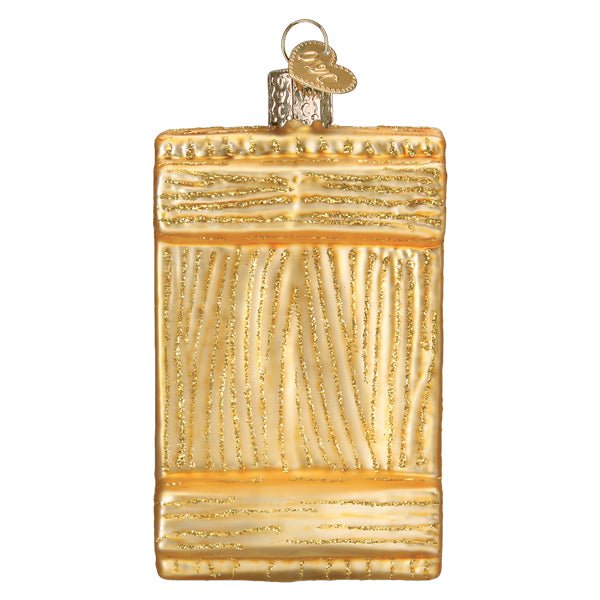 Back of the sushi platter ornament showing the glittered gold wood grain board, on white