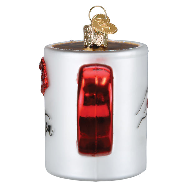 Side view of the Swiftea mug ornament showing the red glittered heart-shaped handle