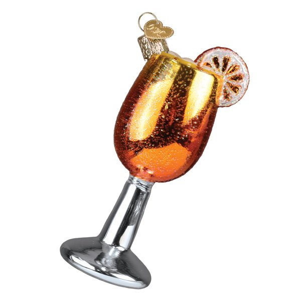 Opposite side of the Aperol Spritz ornament with the citrus wheel on the right, on white