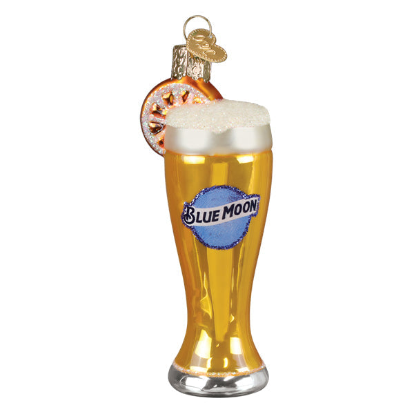 Blue Moon beer glass ornament, front view, golden beer, foamy head, orange slice, and blue logo on white
