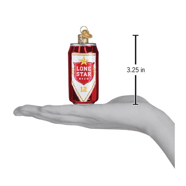 Lone Star Beer can ornament on an open palm beside a 3.25 inch height marker