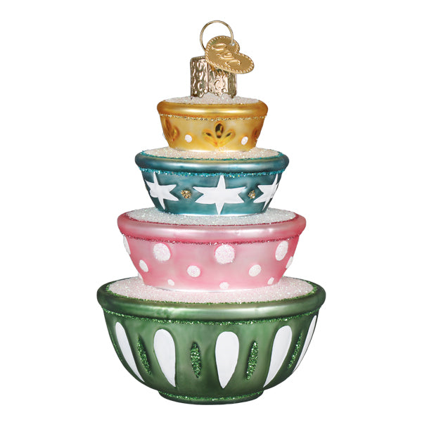 Stacked mixing bowls ornament in gold, teal, pink, and green glass, front view on white for a baker's Christmas tree