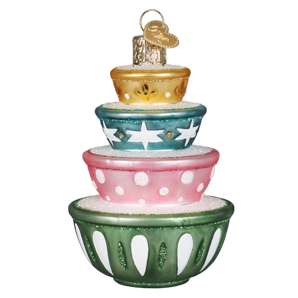 Stacked mixing bowls ornament turned slightly, showing the white stars on the teal bowl and polka dots on the pink