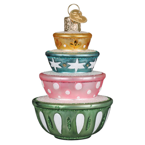 Stacked mixing bowls ornament from another turn, green base with white petal panels and glittered rims