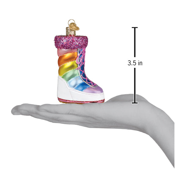 Rainbow snow boot ornament on an open palm beside a 3.5 inch height marker