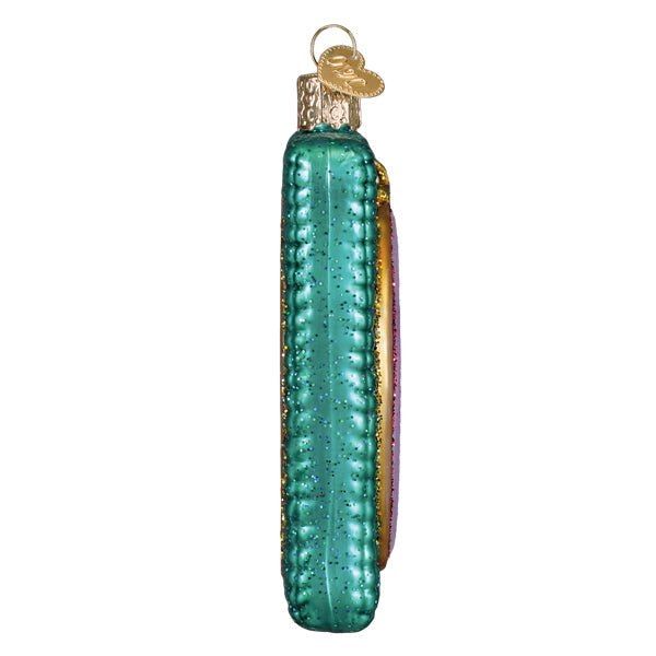 Side view of the thin teal stitched hoop ornament, on white