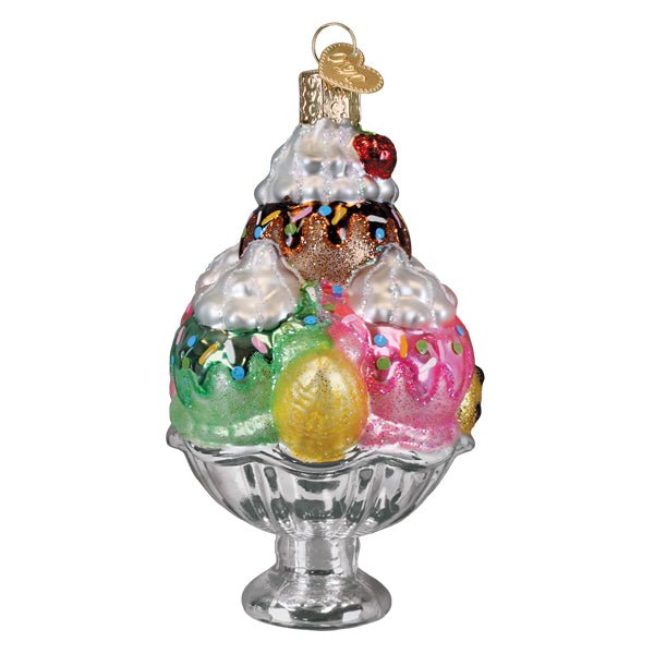 Back of the ice cream sundae ornament with green, pink, and golden scoops under a chocolate drizzle, on white