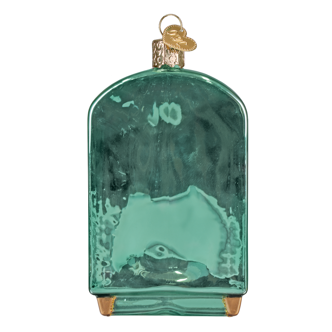 Back of the teal bar cabinet ornament showing smooth glass and a gold cap, on white