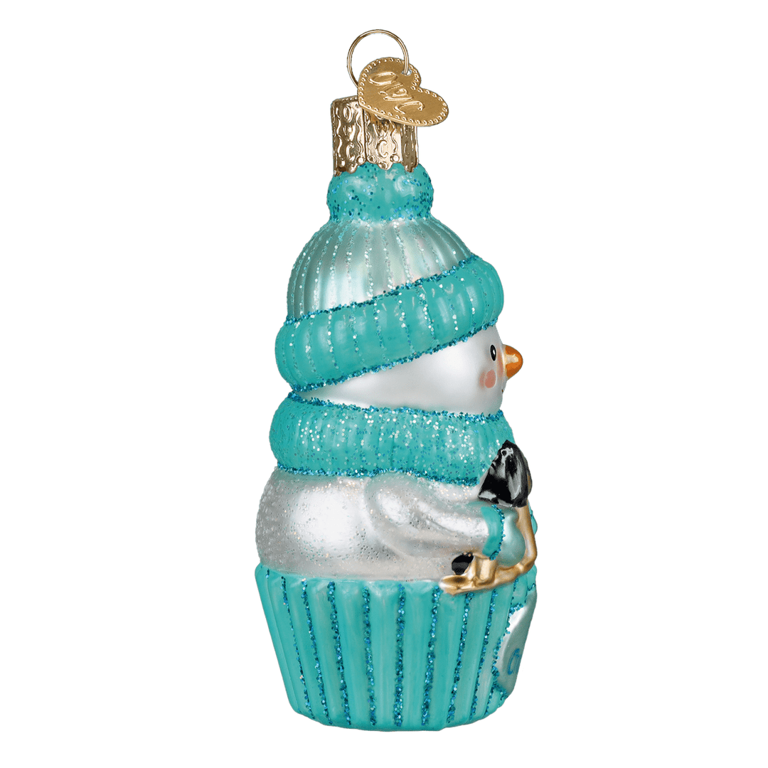 Side of the aqua snow baby ornament with the rocking horse tucked in his arms