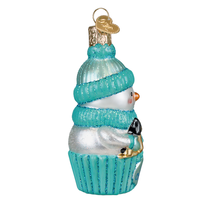 Side of the aqua snow baby ornament with the rocking horse tucked in his arms