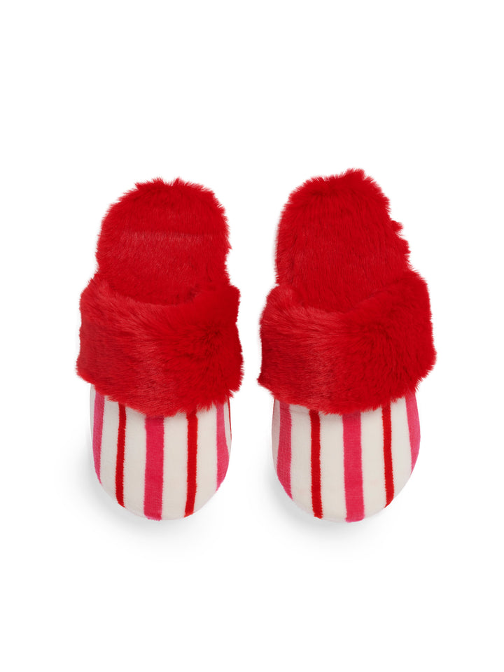 Candy stripe slippers with red faux fur cuffs on white
